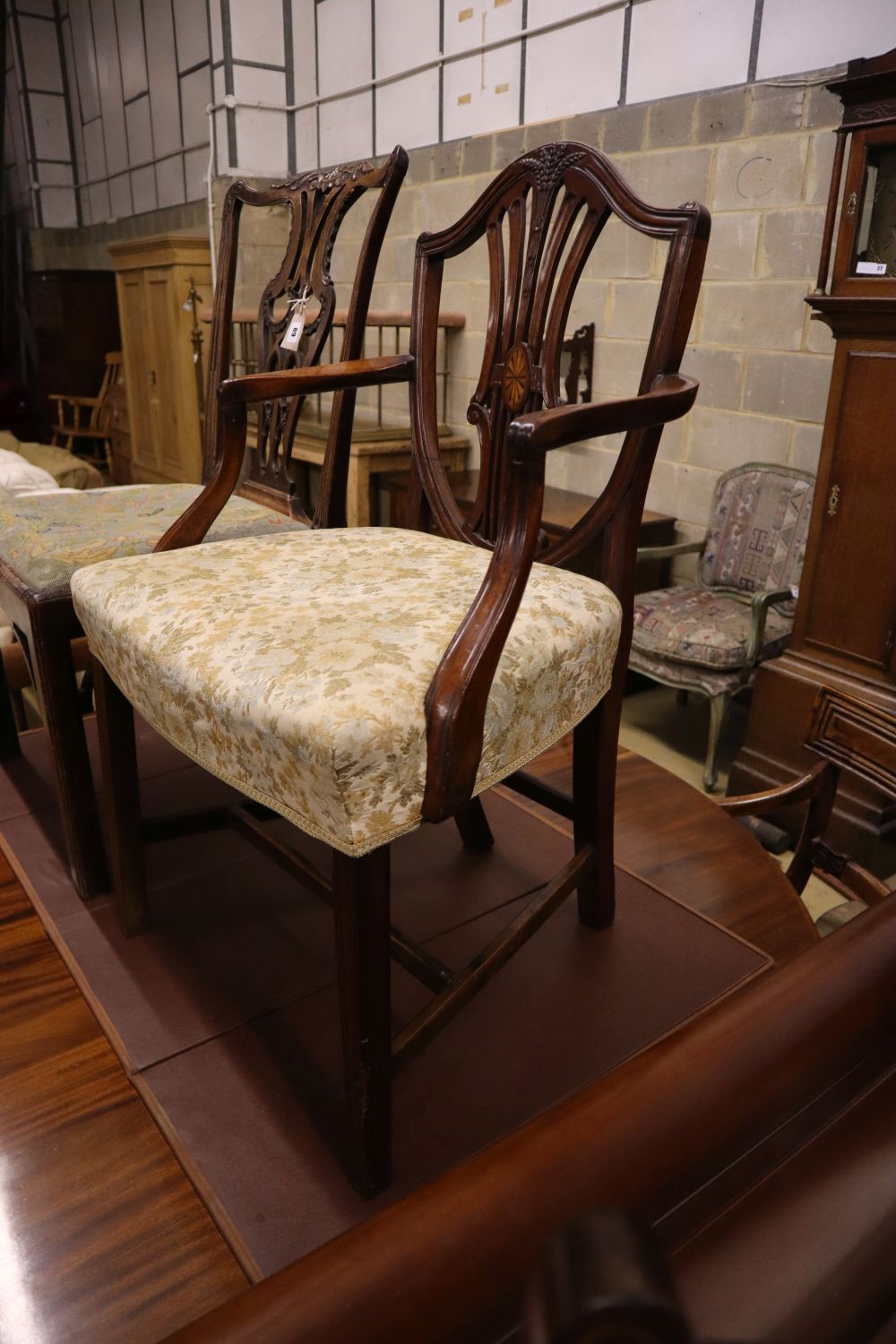 A George III mahogany dining chair together with an inlaid mahogany elbow chair